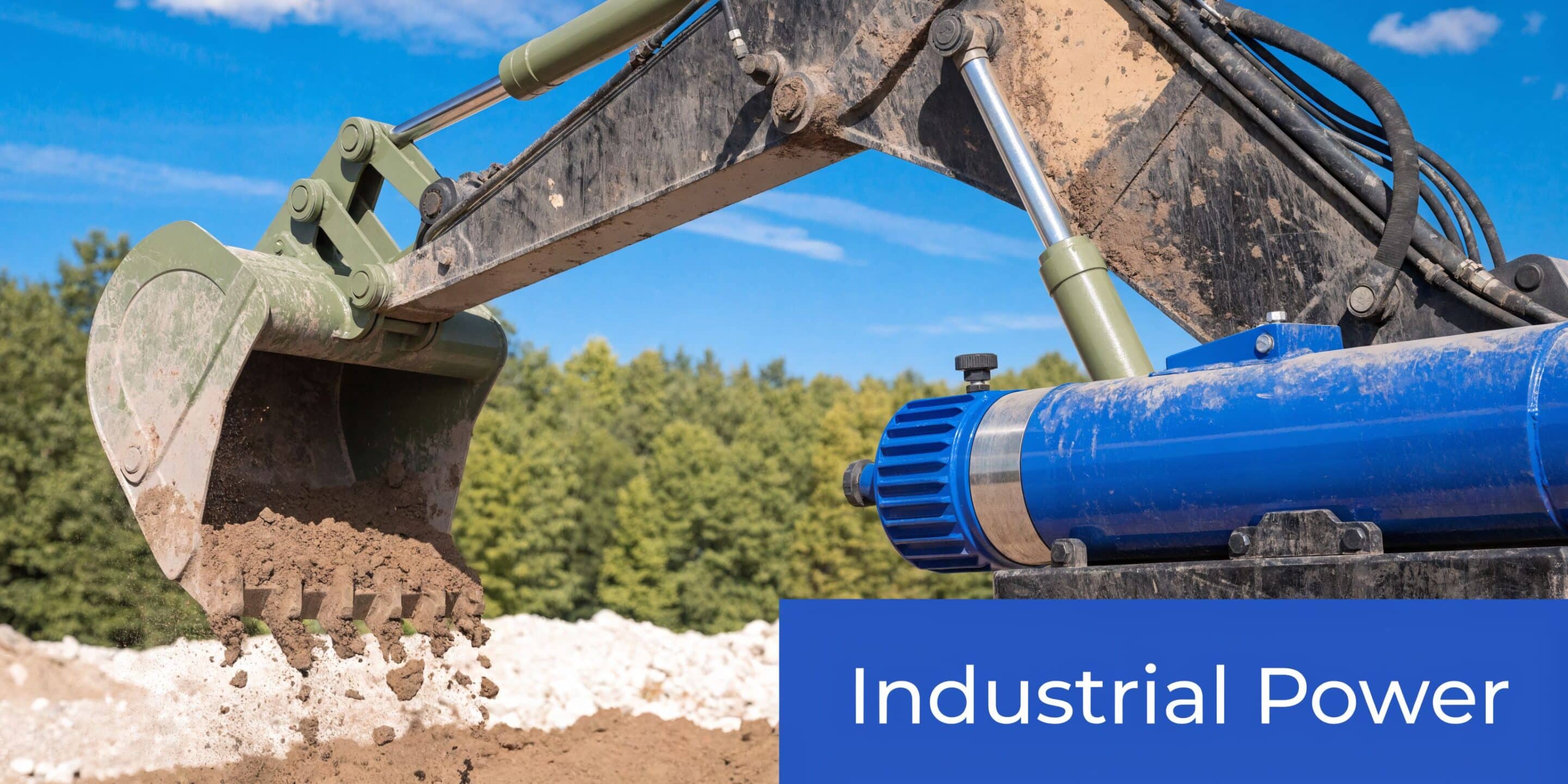 Close-up view of an excavator bucket digging into the ground with a hydraulic motor component nearby.