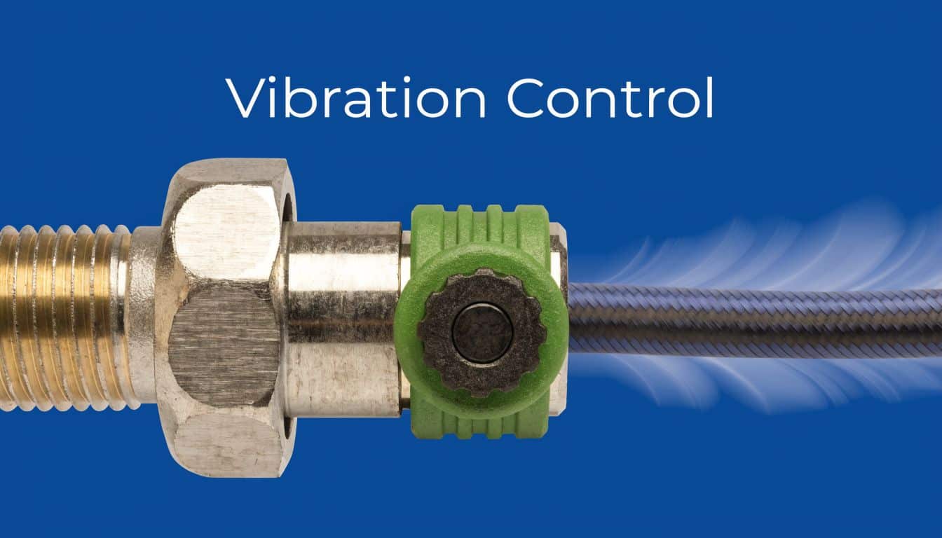 A close-up view of a metal hose fitting secured with a green vibration control clamp on a blue background.